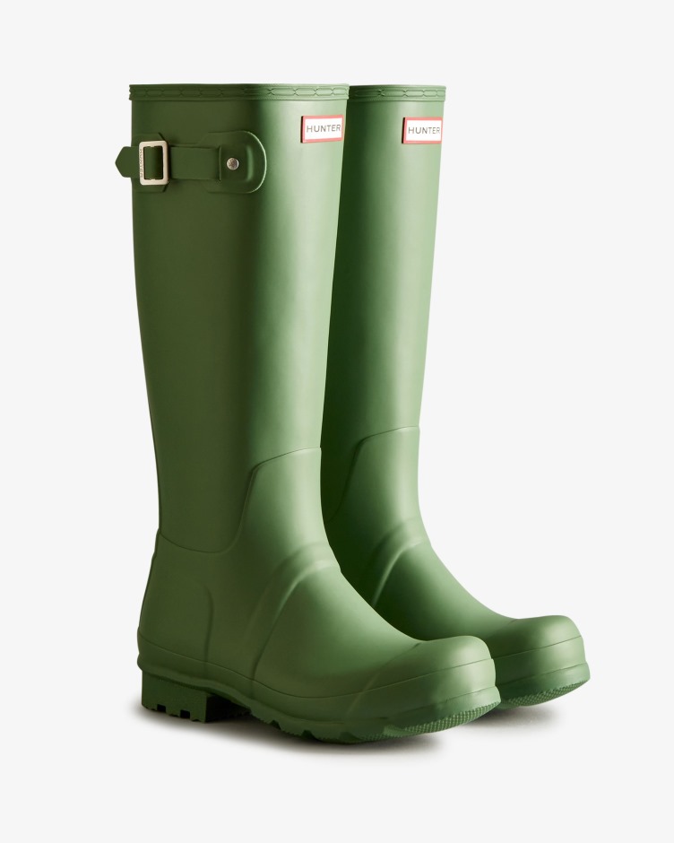As Botas De Chuva Altas Originais Dos Caçadores Caíram Verdes