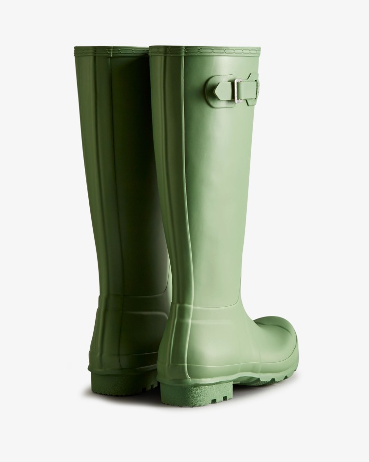 As Botas De Chuva Altas Originais Dos Caçadores Caíram Verdes