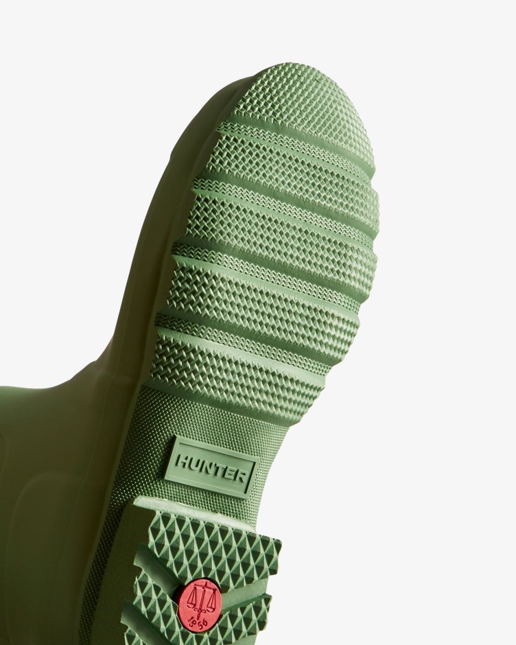 As Botas De Chuva Altas Originais Dos Caçadores Caíram Verdes